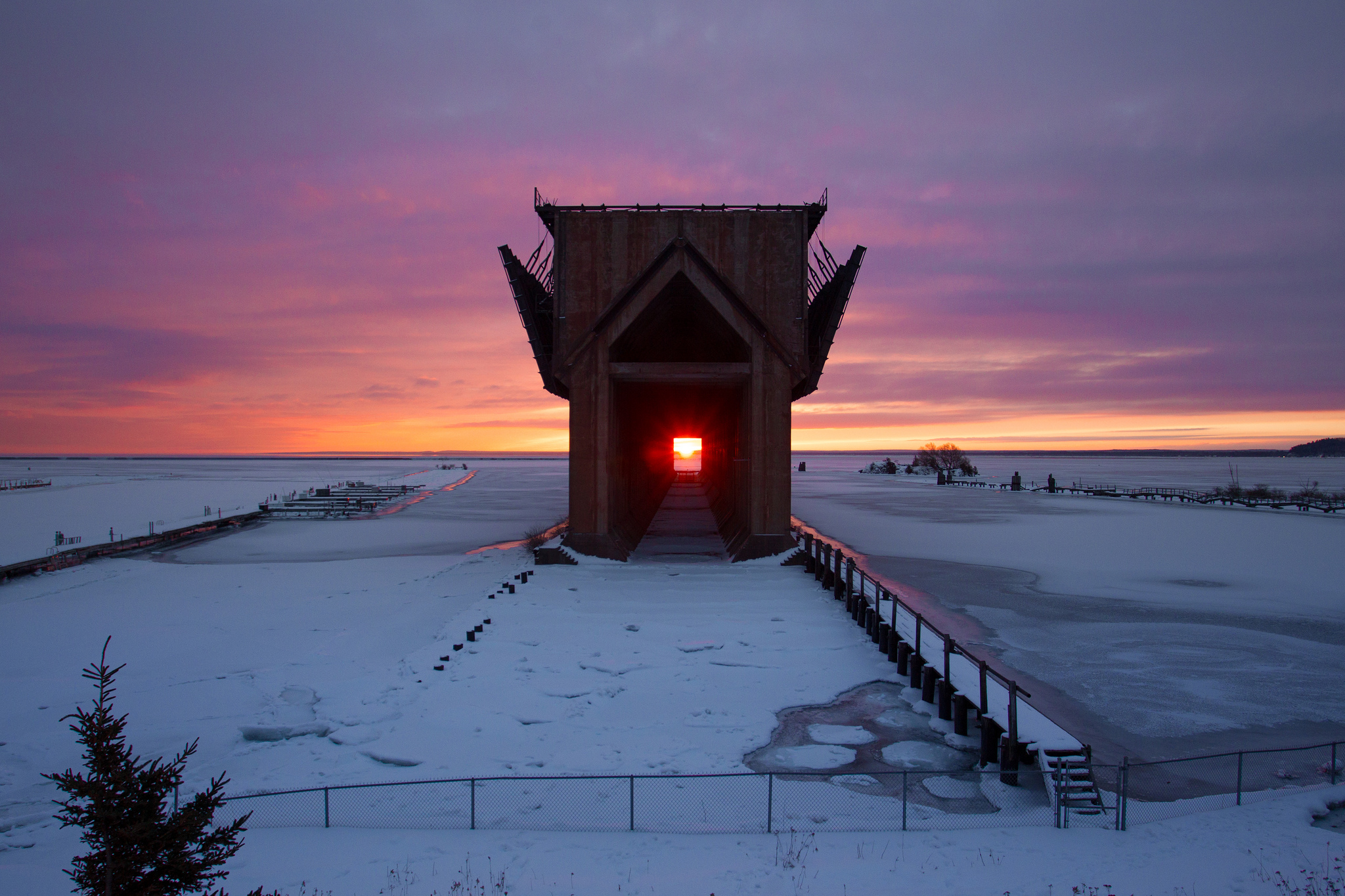 Twice a Year the Sun Rises Through the Center of the Historic Marquette Ore Dock