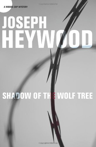 Shadow of the Wolf Tree: A Woods Cop Mystery by Joseph Heywood
